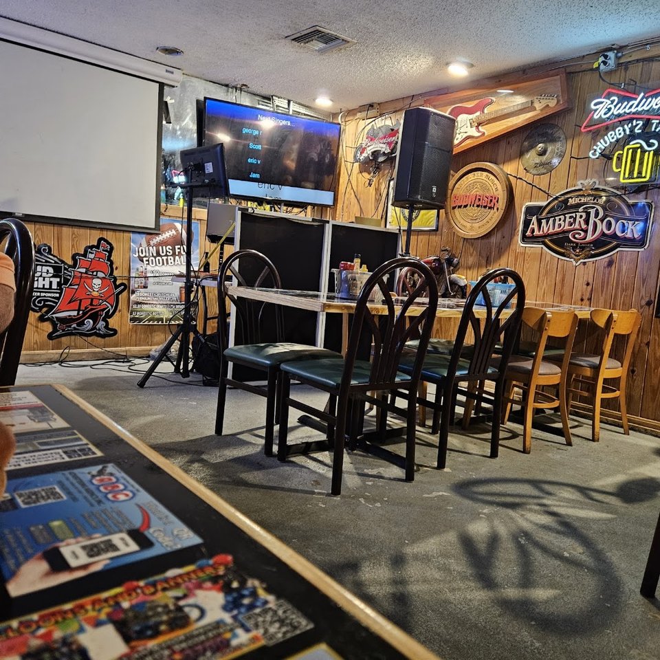 Casual grill seating with tables and booths.